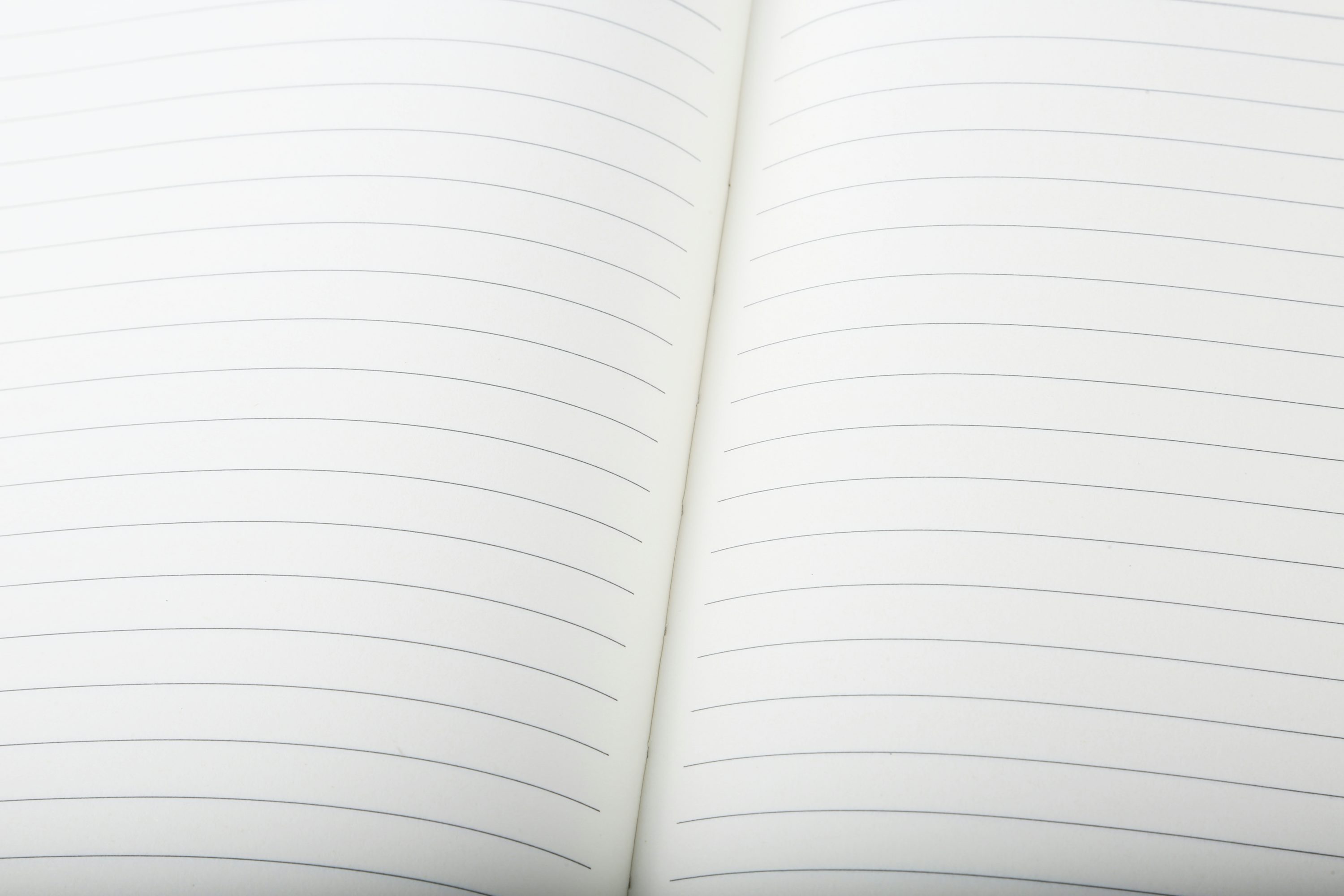 An open notebook on a table.